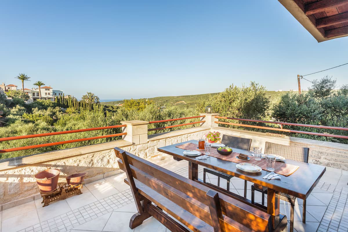 Terrace view over olive groves and the sea